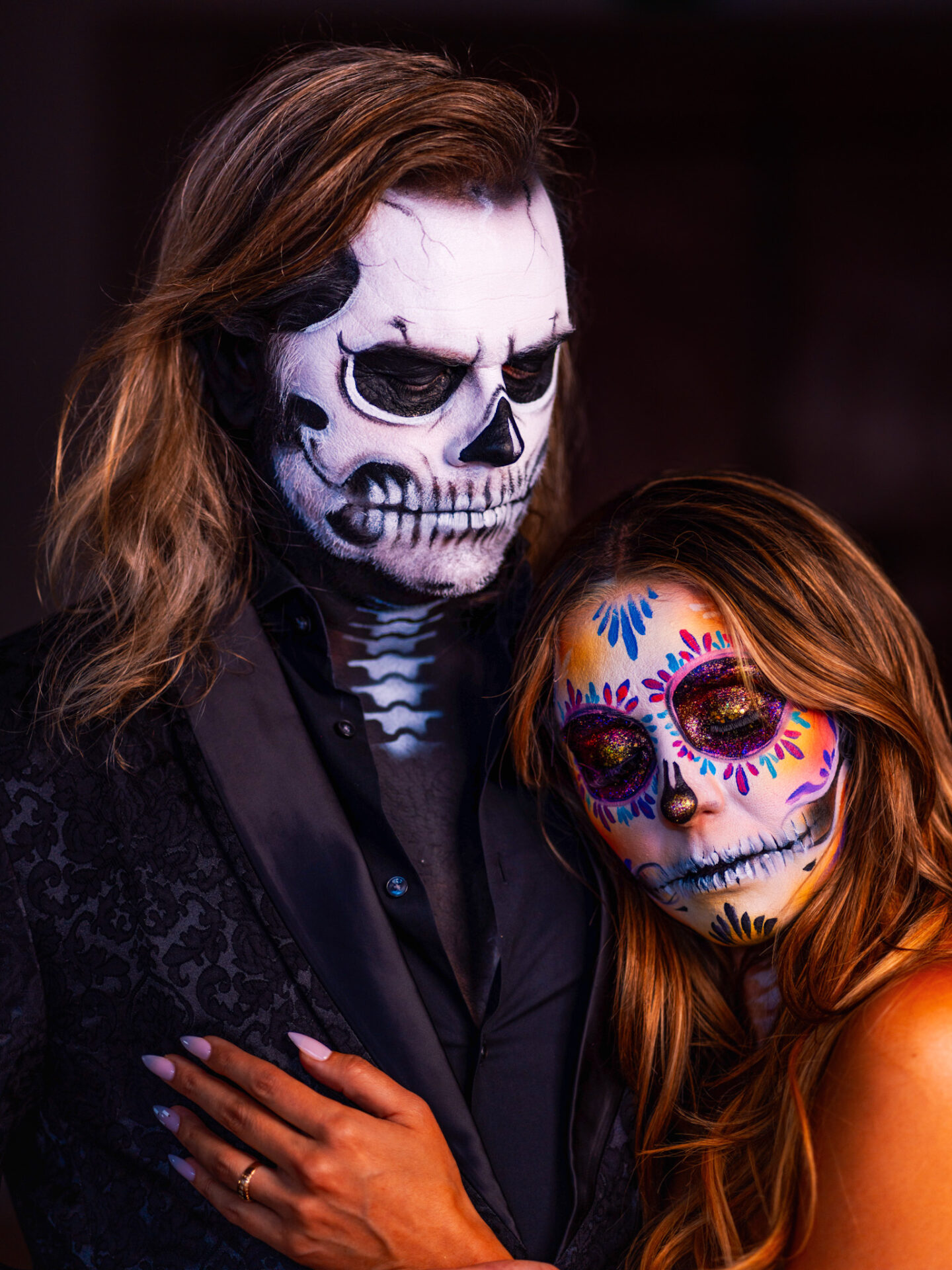 Couple posing with Catrina makeup during Dia de los Muertos mini photoshoot