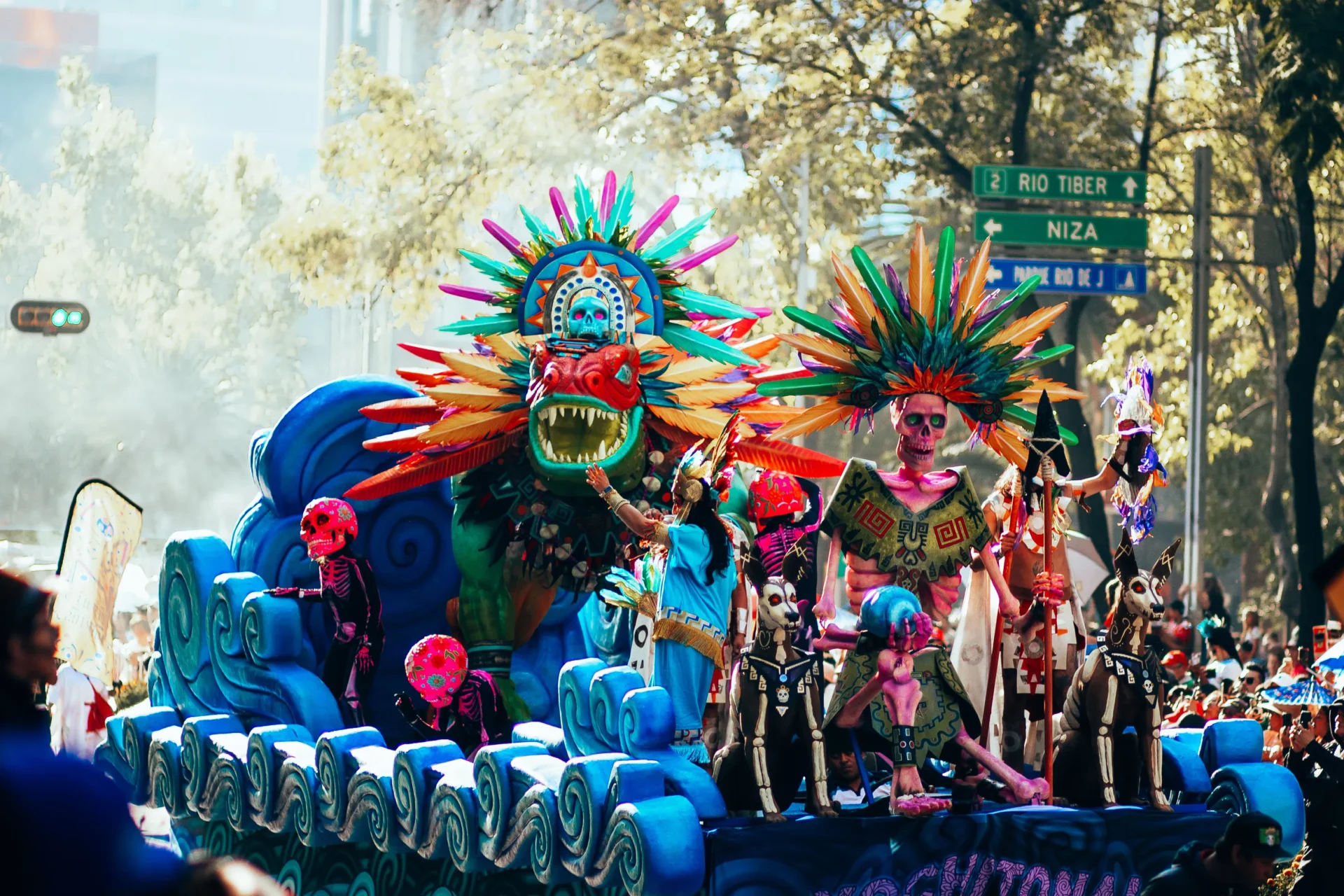 Large-scale artistic float during a Día de Muertos parade